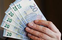New 20 Euro bank notes are displayed in Frankfurt, Germany, Wednesday, March 4, 2015