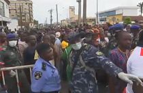 Police in Lagos, Nigeria trying to manage crowds amid coronavirus outbreak