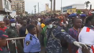 Police in Lagos, Nigeria trying to manage crowds amid coronavirus outbreak