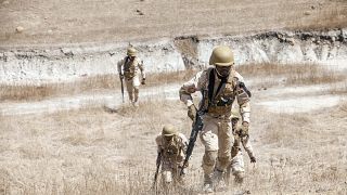 Burkina Faso commando paratroopers exercise under the supervision of Dutch special forces in Thies, Senegal on February 18, 2020.