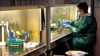 A technician works in the lab of the COVID-19 department of the Policlinic of Tor Vergata in Rome, Friday, April 17, 2020.