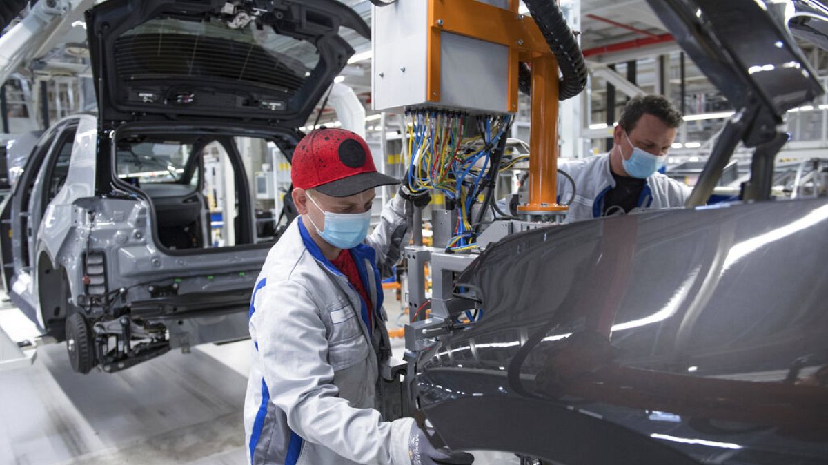 Virus Outbreak Germany Volkswagen Restart Production