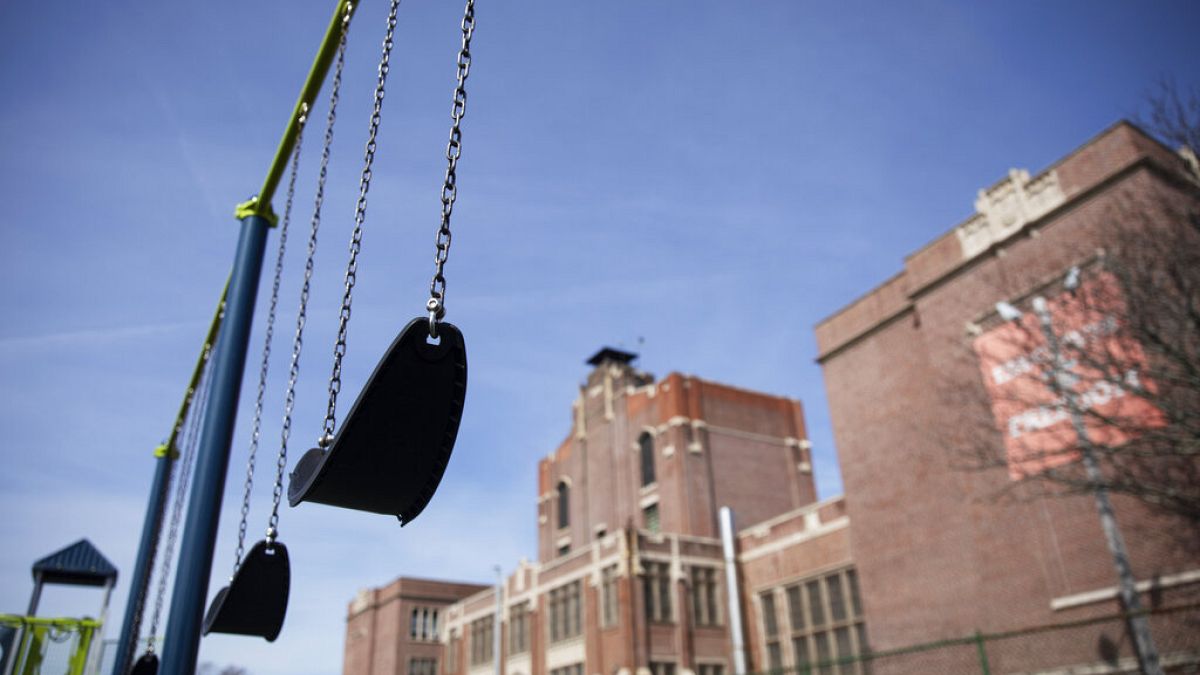 Swings sit empty on a playground outside Achievement First charter school Saturday, March 7, 2020, in Providence, Rhode Island, US