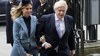 Britain's Prime Minister Boris Johnson and his partner Carrie Symonds on March 9, 2020.