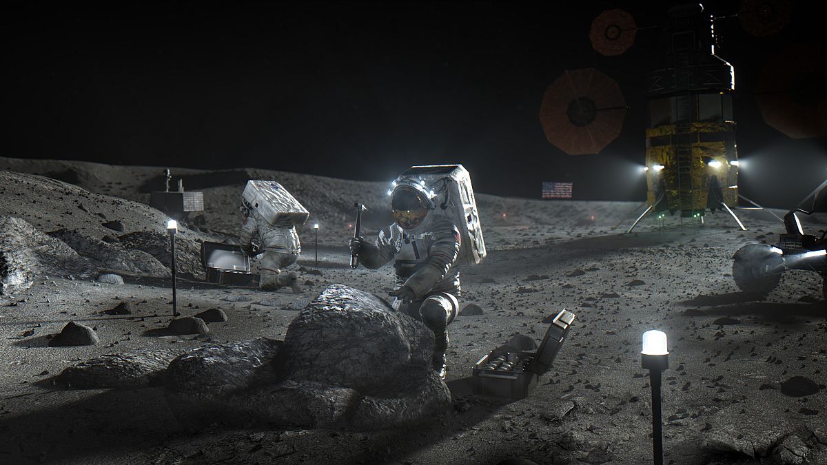 This illustration made available by NASA in April 2020 depicts Artemis astronauts on the Moon.