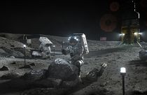 This illustration made available by NASA in April 2020 depicts Artemis astronauts on the Moon.
