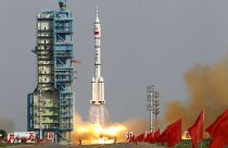FILE: In this file photo taken Saturday, June 16, 2012, a Shenzhou 9 spacecraft Long March rocket with 3 astronauts including China's first female astronaut launches