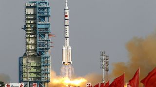 FILE: In this file photo taken Saturday, June 16, 2012, a Shenzhou 9 spacecraft Long March rocket with 3 astronauts including China's first female astronaut launches