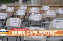 Restaurateurs in Athens stage 'empty chair' protest at restricted reopening plans