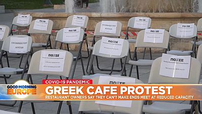 Restaurateurs in Athens stage 'empty chair' protest at restricted reopening plans