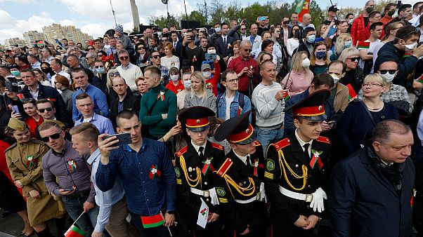 People attend the Victory Day military parade that marked the 75th anniversary of the allied victory over Nazi Germany, in Minsk, Belarus, Saturday, May 9, 2020 People attend the Victory Day military parade that marked the 75th anniversary of the allied victory over Nazi Germany, in Minsk, Belarus, Saturday, May 9, 2020