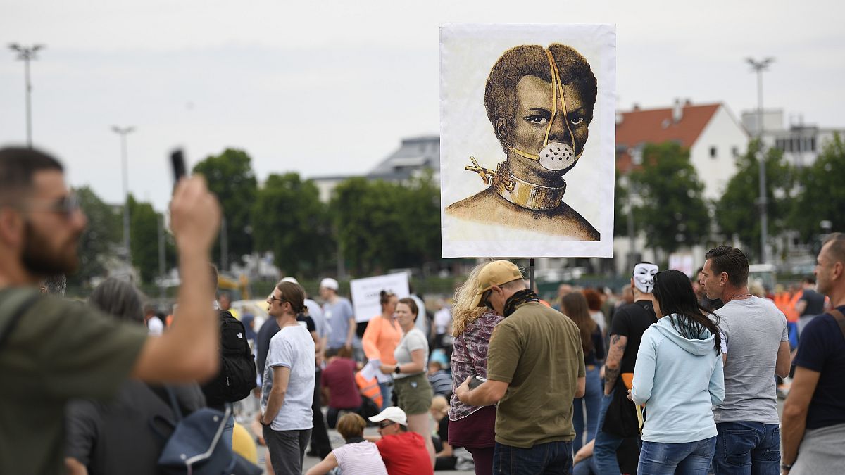 Demonstration gegen Corona-Regeln in Stuttgart (Photo by THOMAS KIENZLE / AFP)
