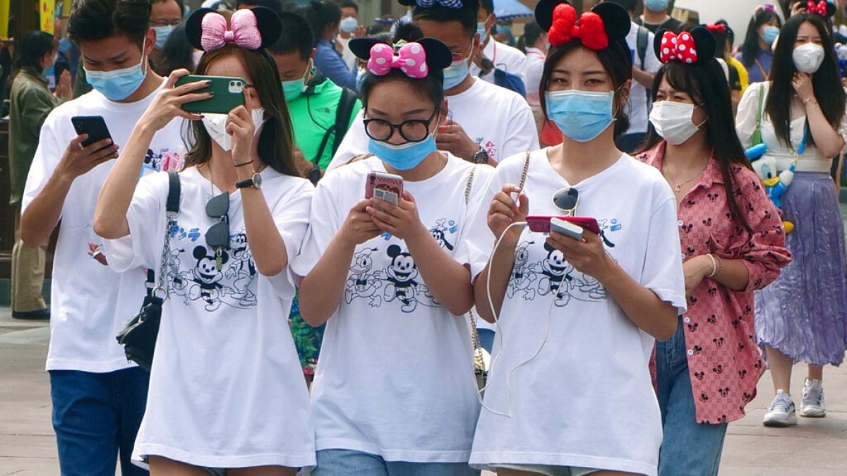 APTOPIX Virus Outbreak China Disneyland