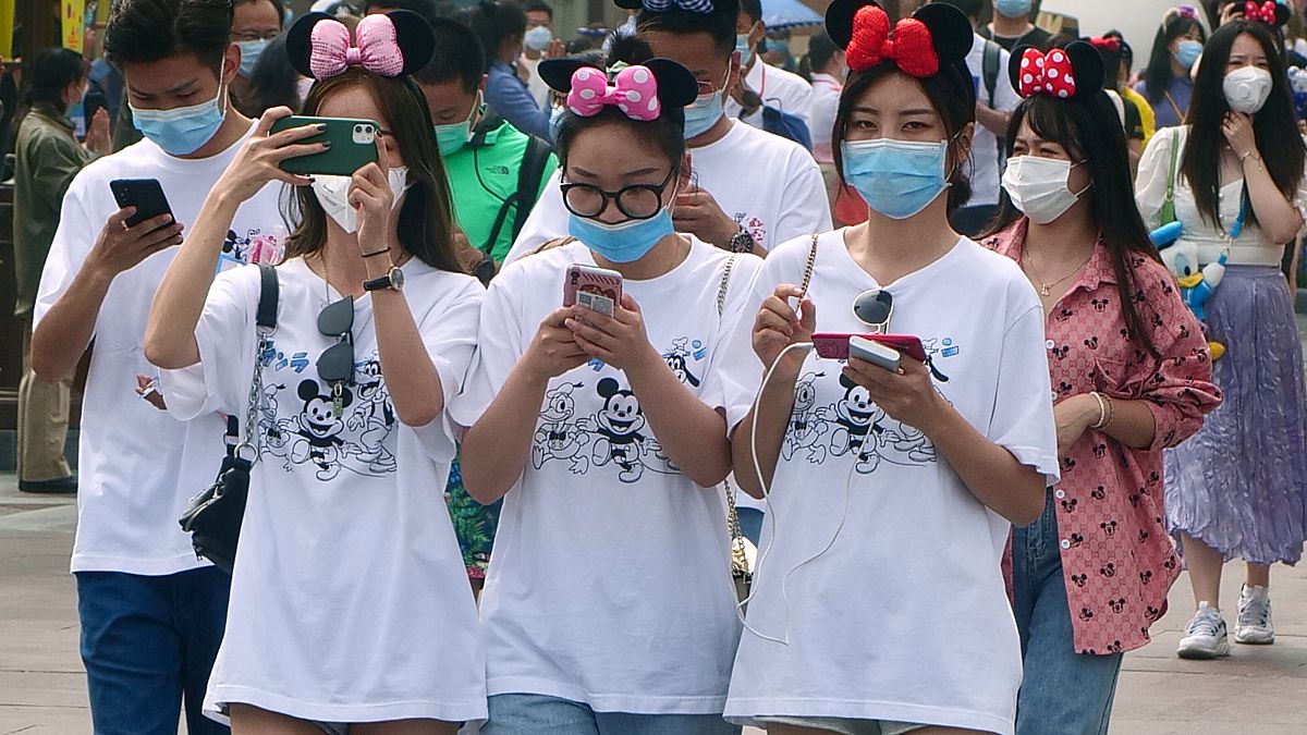 APTOPIX Virus Outbreak China Disneyland