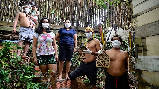 Brezilya'nın en büyük eyaleti olan Amazonas'ın başkenti Manaus'ta yaşayan yerli topluluk Brezilya'nın en büyük eyaleti olan Amazonas'ın başkenti Manaus'ta yaşayan yerli topluluk