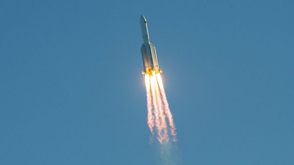 (FILES) This file photo taken on May 5, 2020 shows a Long March 5B rocket lifting off from the Wenchang launch site on China's southern Hainan island. (FILES) This file photo taken on May 5, 2020 shows a Long March 5B rocket lifting off from the Wenchang launch site on China's southern Hainan island.