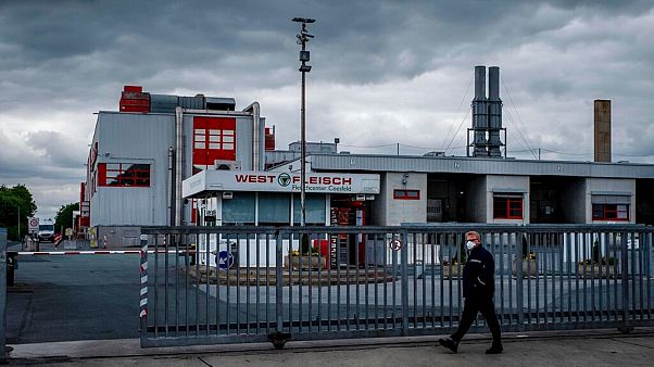 The Westfleisch slaughterhouse is seen in Coesfeld, Germany, Tuesday, May 12, 2020. Hundreds of the workers were tested positive on the coronavirus and were put on quarantine. The Westfleisch slaughterhouse is seen in Coesfeld, Germany, Tuesday, May 12, 2020. Hundreds of the workers were tested positive on the coronavirus and were put on quarantine.