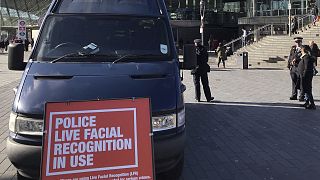 A mobile police facial recognition facility outside a shopping centre in London Tuesday Feb. 11, 2020