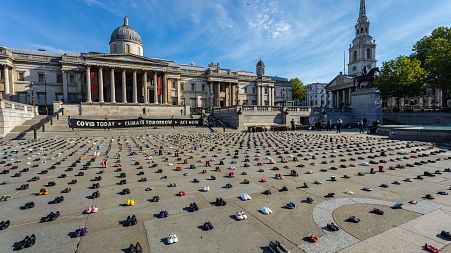 Trafalgar Square, London. Extinction Rebellion cover it with children's shoes in protest against climate change