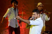 Morocco singer Saad Lamjarred performs at Carthage Festival on July 30, 2016 at the romain theatre of carthage near Tunis. (Photo by FETHI BELAID / AFP)