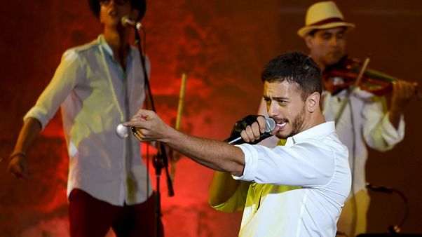 Morocco singer Saad Lamjarred performs at Carthage Festival on July 30, 2016 at the romain theatre of carthage near Tunis. (Photo by FETHI BELAID / AFP) Morocco singer Saad Lamjarred performs at Carthage Festival on July 30, 2016 at the romain theatre of carthage near Tunis. (Photo by FETHI BELAID / AFP)