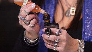 High school principal displays vaping devices that were confiscated from students