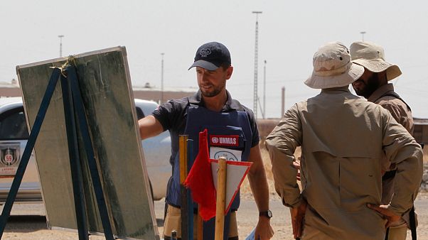 موظفون أجانب في مدينة بيجي، التي تعتبر منطقة غنية بالنفط موظفون أجانب في مدينة بيجي، التي تعتبر منطقة غنية بالنفط