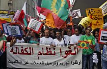 Abolish the Kafala system. Stop trying to deporting illegal domestic workers," during a rally to mark International Domestic Workers Day, in Beirut, Lebanon, Sunday, June 