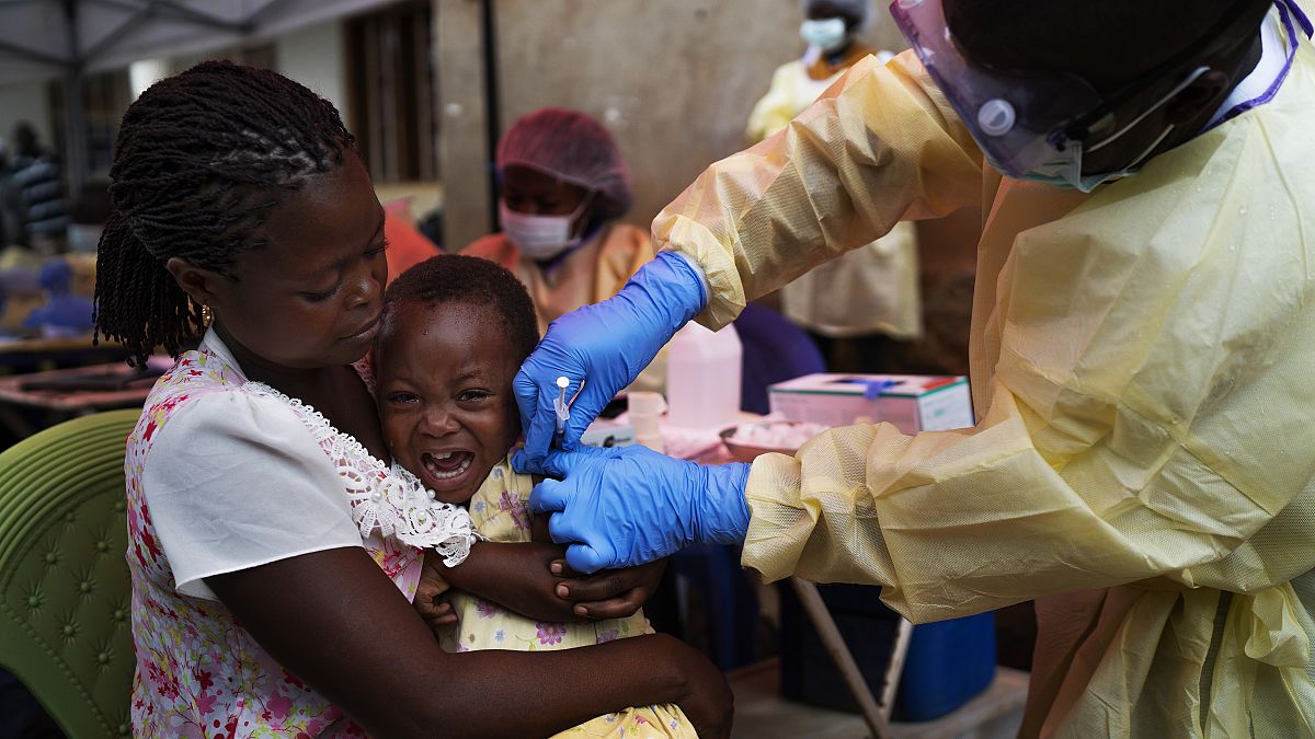 In this Saturday, July 13, 2019 file photo, a child is vaccinated against Ebola in Beni, Congo.