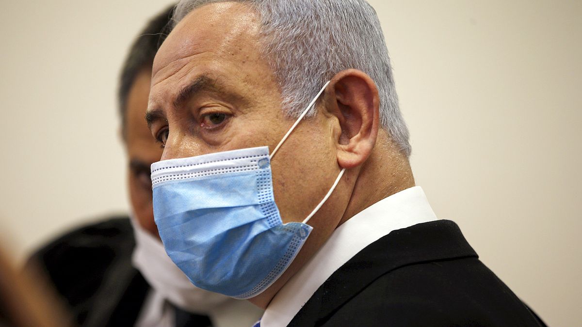 Netanyahu said his head was "held high" as he began the graft trial