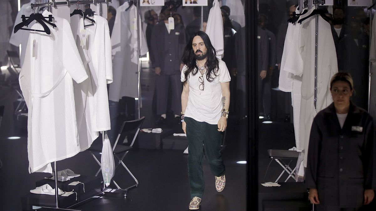 Designer Alessandro Michele walks out at the end of Gucci's Fall/Winter 2020/2021 collection, presented in Milan, Italy. (February, 2020)
