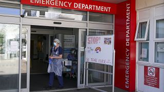 A triage nurse waits for patients to arrive in the Emergency Department at Frimley Park Hospital Frimley Park Hospital, in Camberley, England, May 22, 2020. 