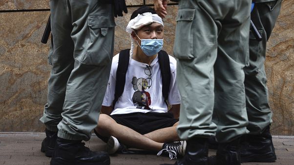 Uno de los manifestantes detenido en Hong Kong Uno de los manifestantes detenido en Hong Kong