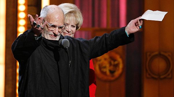 In this June 12, 2011 file photo, Larry Kramer accepts the Tony Award for Best Revival of a Play for "The Normal Hearrt". In this June 12, 2011 file photo, Larry Kramer accepts the Tony Award for Best Revival of a Play for "The Normal Hearrt".