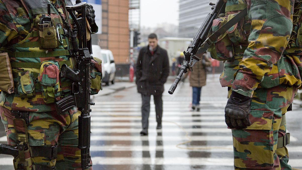 Belgian soldiers patrol in front of EU headquarters in Brussels on Monday, Jan. 19, 2015.