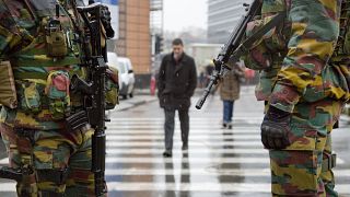 Belgian soldiers patrol in front of EU headquarters in Brussels on Monday, Jan. 19, 2015.