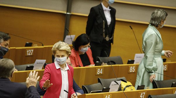 European Commission President Ursula von der Leyen, third left, speaks with MEP's prior to her opening address during the plenary at the European Parliament in Brussels European Commission President Ursula von der Leyen, third left, speaks with MEP's prior to her opening address during the plenary at the European Parliament in Brussels