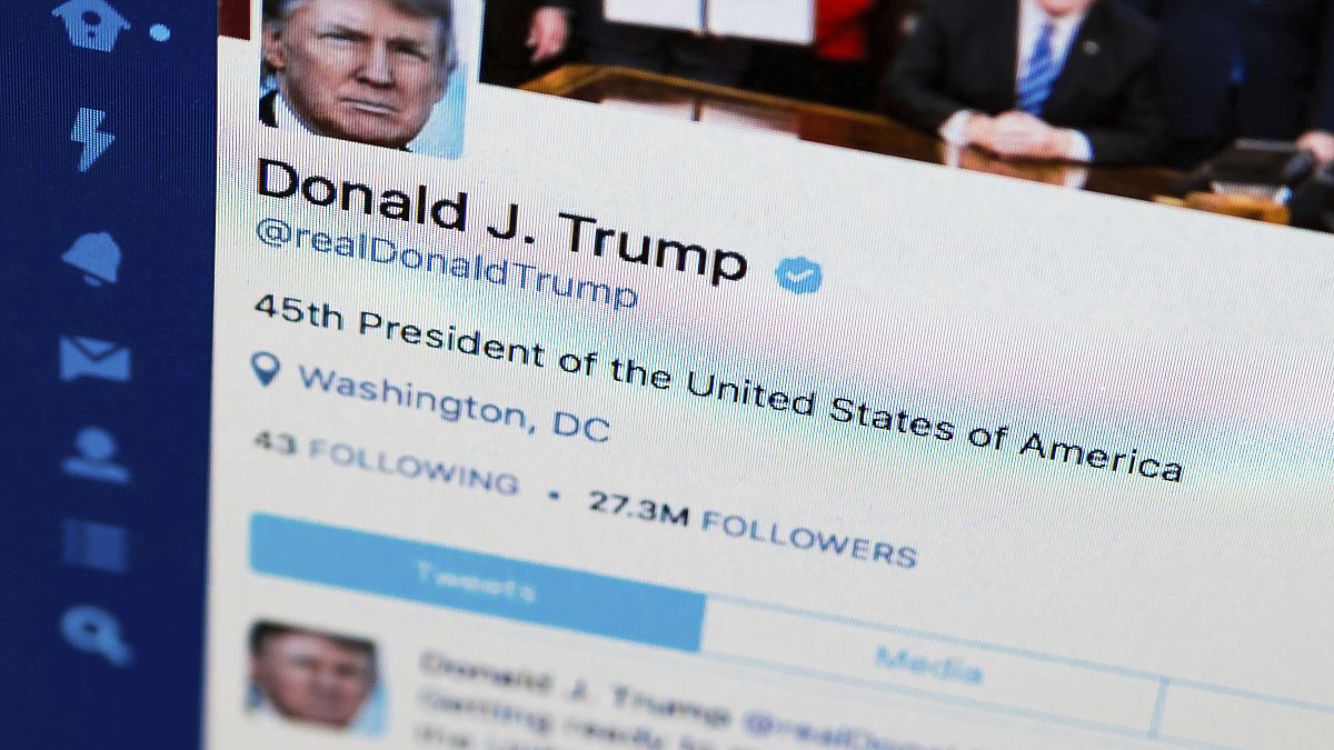 This April 3, 2017, file photo shows U.S. President Donald Trump's Twitter feed on a computer screen in Washington. President Donald Trump is claiming that Twitter has removed