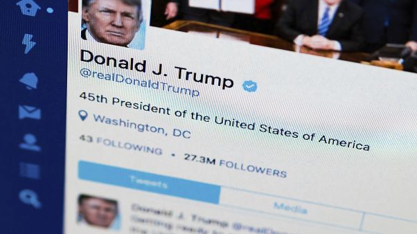 This April 3, 2017, file photo shows U.S. President Donald Trump's Twitter feed on a computer screen in Washington. President Donald Trump is claiming that Twitter has removed This April 3, 2017, file photo shows U.S. President Donald Trump's Twitter feed on a computer screen in Washington. President Donald Trump is claiming that Twitter has removed