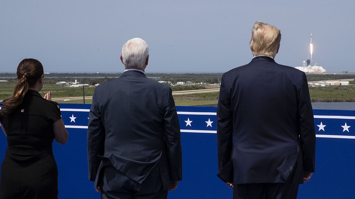 President Donald Trump, Vice President Mike Pence and Karen Pence view the SpaceX flight to the International Space Station, at Kennedy Space Center, Saturday, May 30