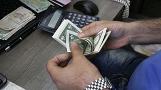Currency exchange bureau worker, Tehran, Iran