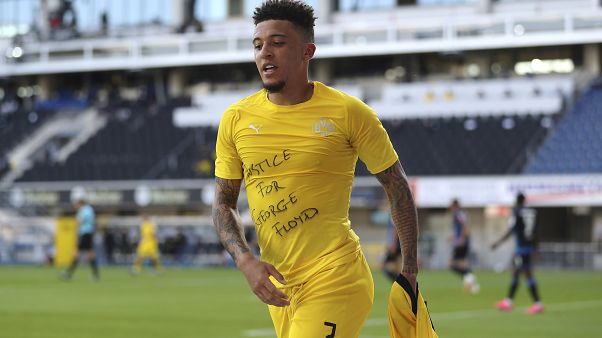 Jadon Sancho exibe mensagem de apoio a George Floyd Jadon Sancho exibe mensagem de apoio a George Floyd