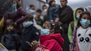 Virus Outbreak Greece Migrants