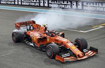 Ferrari driver Charles Leclerc of Monaco celebrates at finish line after he placed third in the Emirates Formula One Grand Prix, Sunday, Dec.1, 2019.