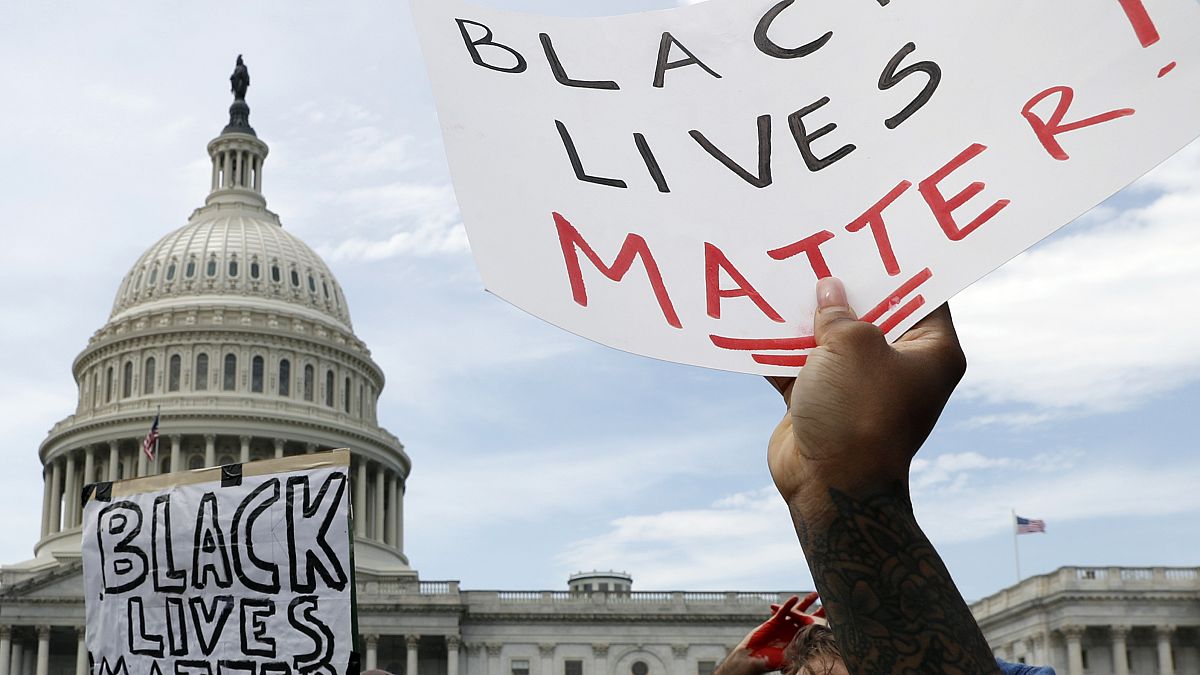 Demonstrators protest the death of George Floyd as they gather Wednesday, June 3, 2020, on the East side of the U.S. Capitol in Washington. 