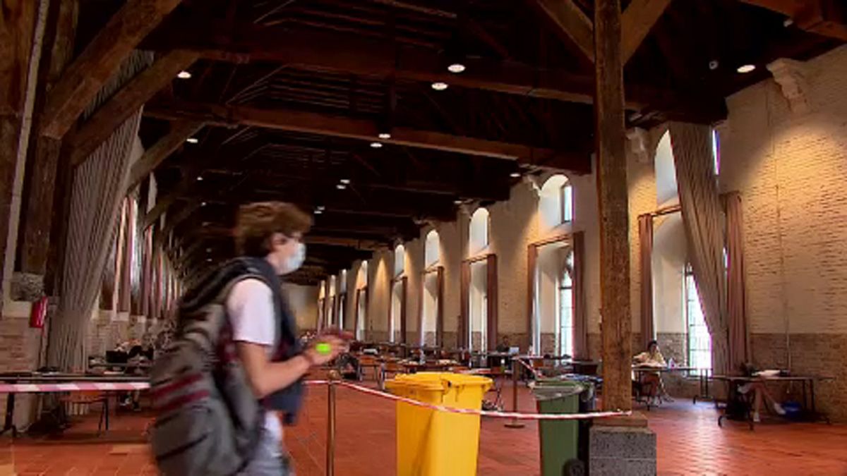 Belgian students study inside UNESCO World Heritage sites during coronavirus pandemic, May 2020.