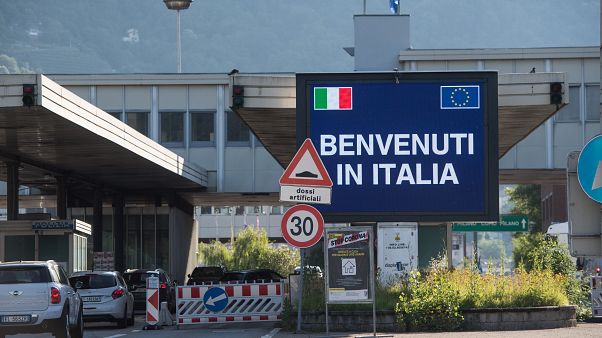 Cars cross the border station Chiasso Brogeda between Switzerland and Italy, in Chiasso, Switzerland, Wednesday, June 3, 2020. Cars cross the border station Chiasso Brogeda between Switzerland and Italy, in Chiasso, Switzerland, Wednesday, June 3, 2020.