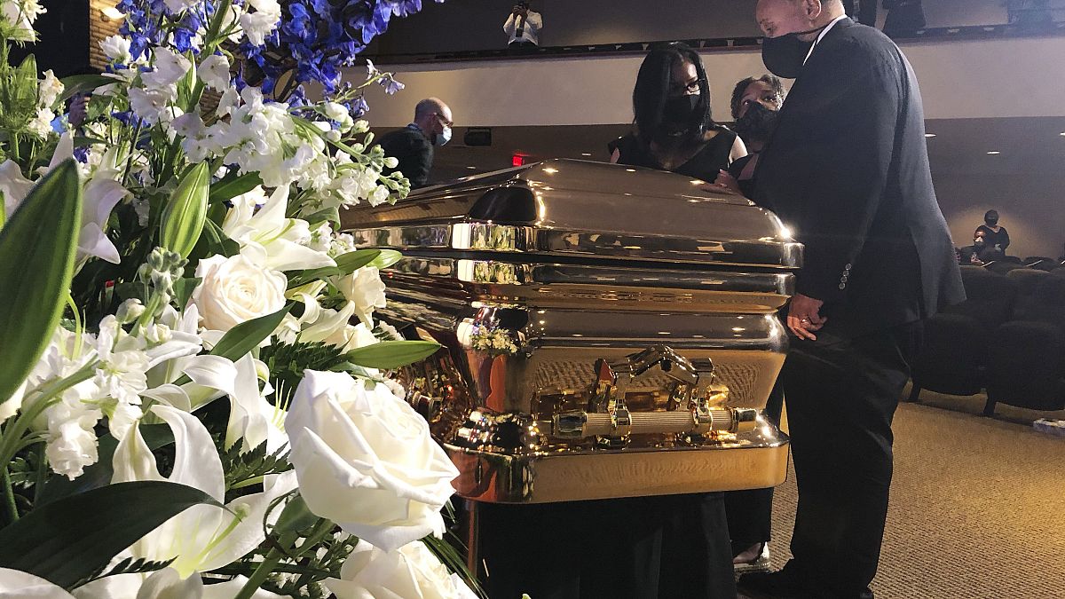 Martin Luther King III takes a moment by George Floyd's casket Thursday, June 4, 2020, before a memorial service for George Floyd in Minneapolis. 
