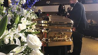 Martin Luther King III takes a moment by George Floyd's casket Thursday, June 4, 2020, before a memorial service for George Floyd in Minneapolis.