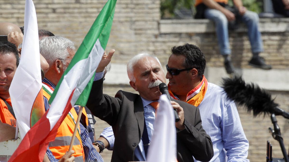 Leader of the Orange Vests movement, Antonio Pappalardo, addresses a rally in Rome, Tuesday, June 2, 2020